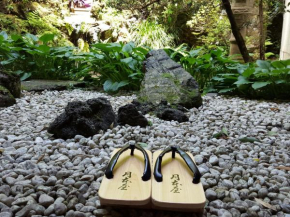 Отель Tsukimotoya Ryokan  Тоёока
